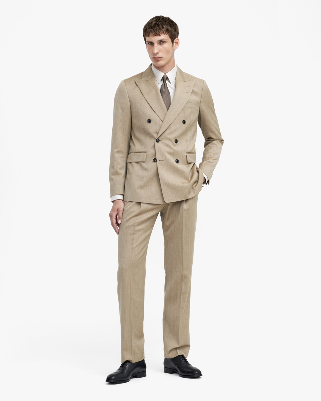 man in beige suit